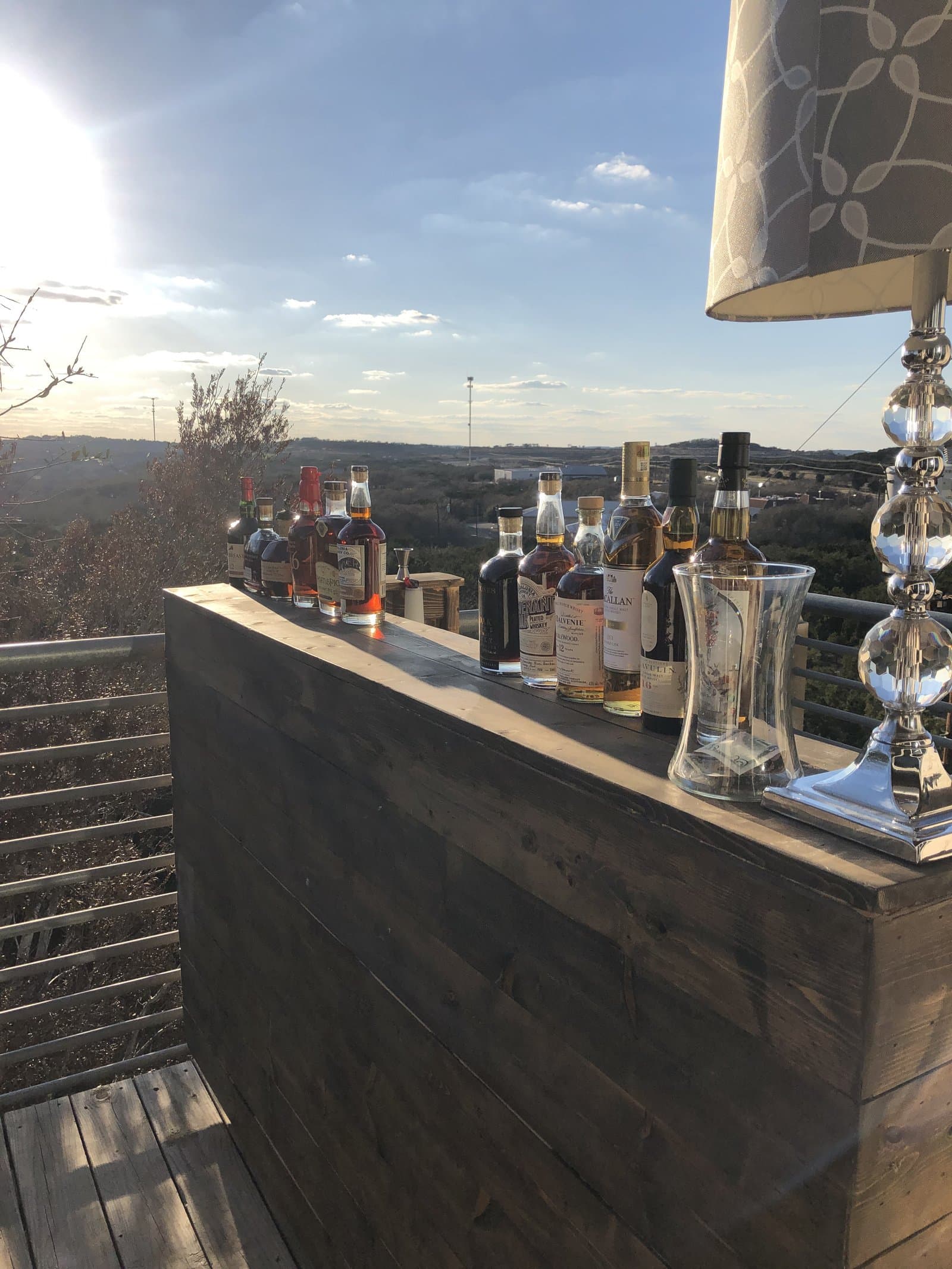 Whiskey lineup at sunset