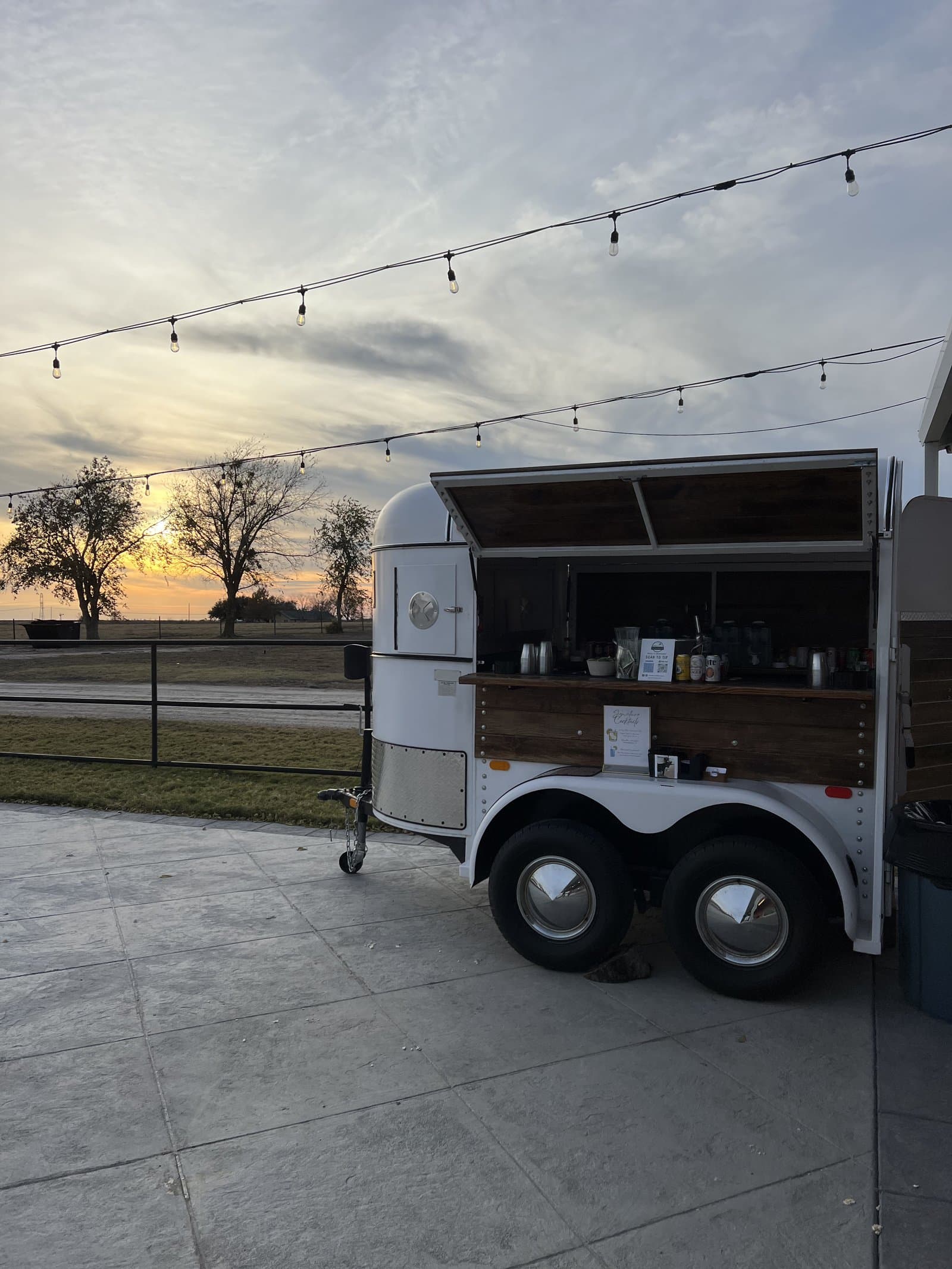 Horse trailer bar at sunset